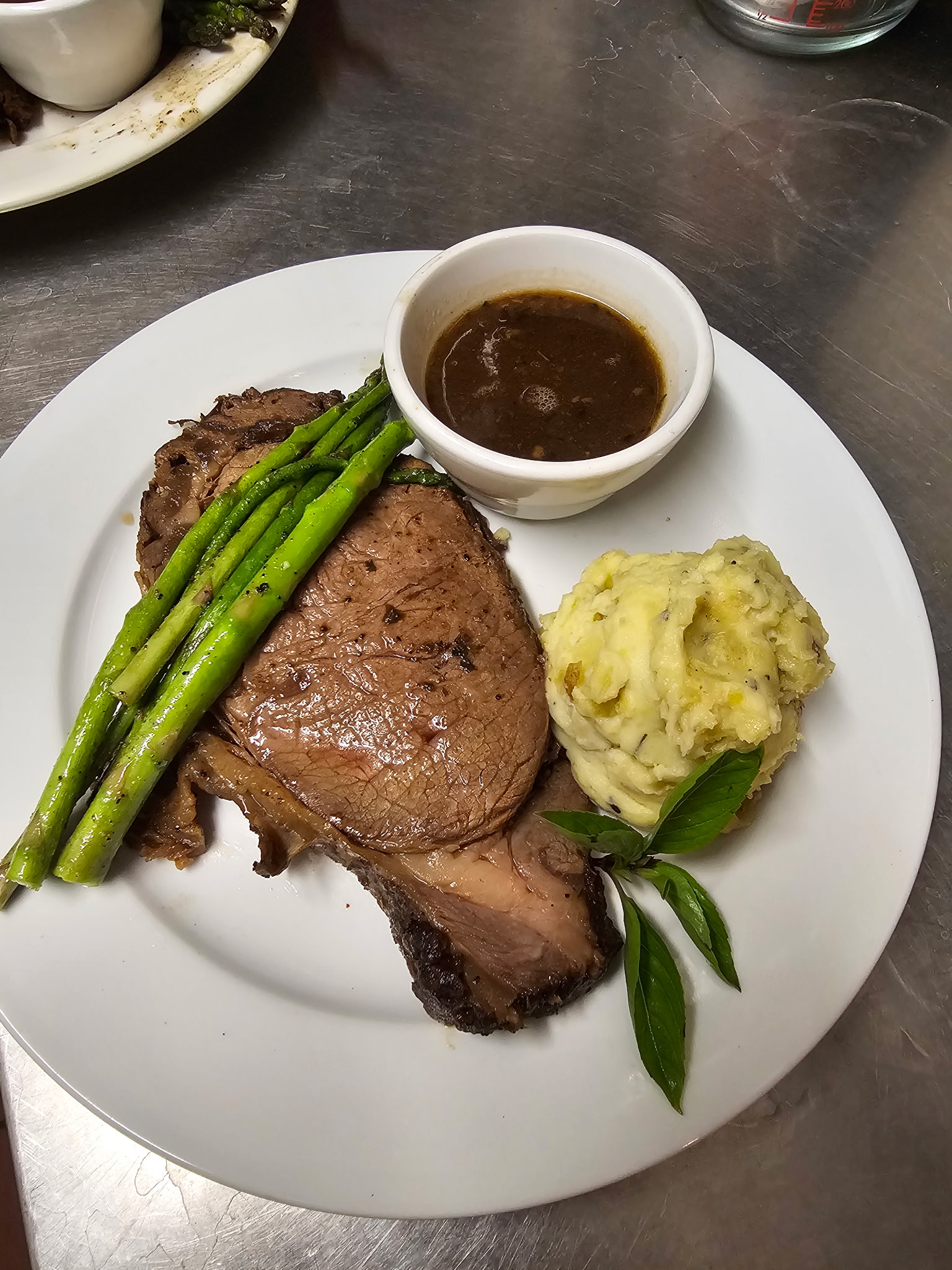 Prime rib with mashed potatoes and asparagus